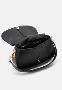 Tommy Hilfiger HERITAGE SADDLE BAG - Käekott - black