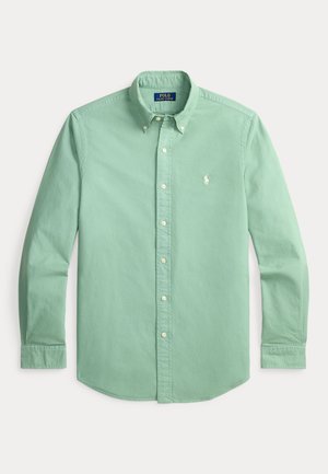 Long-sleeve mint green button-down shirt with buttoned collar and white embroidered logo on left chest.