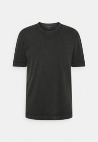 Donkergroene korte mouw t-shirt van zacht katoen, met een ronde halslijn en rechte zoom met minimale stikseldetails.