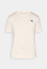 Light beige athletic t-shirt with short sleeves, textured shoulder panels, and a blue logo on the front. Soft, moisture-wicking material.