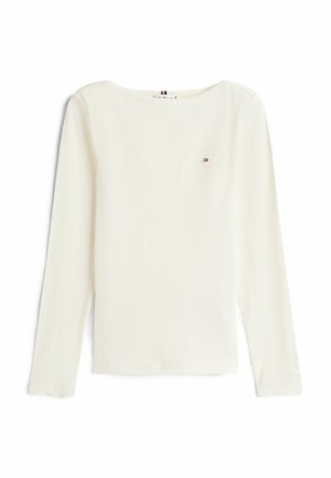 Langærmet, ribbet, off-white top. Har en rund neckline og lille logo på brystet. Blødt stof med minimalistisk design.