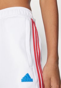 adidas Sportswear TIRO CUT 3 STRIPES TRACKPANTS - Treniņtērpa apakšdaļas - white/team navy blue/better scarlet