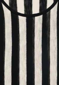 Knit fabric featuring vertical stripes in black and cream. The texture appears soft with a rounded neckline at the top.