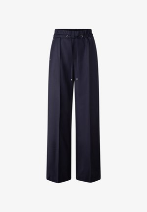 Navy blue wide-leg pants with elastic waist and drawstring, featuring side pockets and metal eyelets on the waistband.