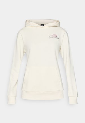 Kremine spalva gobtuvu megztinis su kengūros kišene, ribotais rankogaliais ir šviesiai rožine logotipo grafika kairėje krūtinės pusėje. Minkšta, medvilnės mišinio medžiaga.