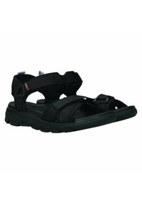 Sandales de sport noires avec des straps en velcro ajustables, semelles en caoutchouc solides et dessus en tissu texturé pour adhérence et confort.
