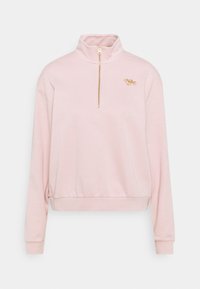 Sudadera de Nike de color rosa claro con cuello alto, cremallera dorada y pequeño logo dorado en el lado izquierdo del pecho. Confeccionada en tela suave y texturizada.