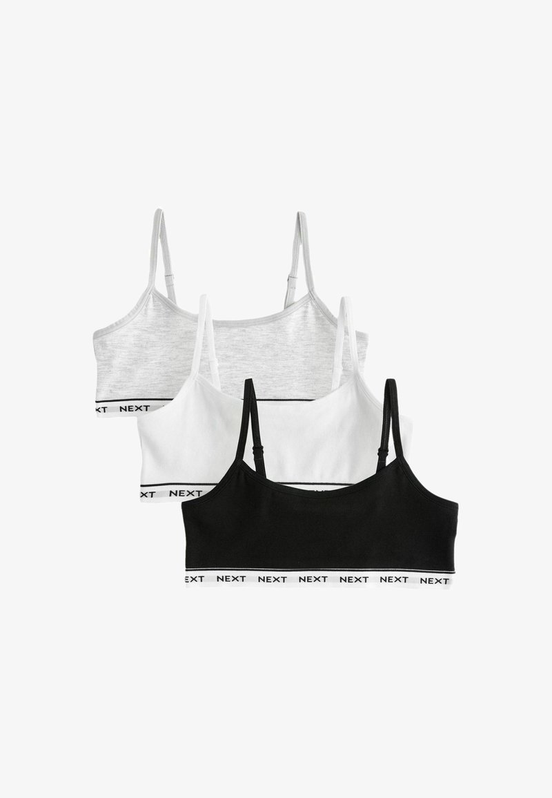 Trei bralette-uri dintr-un amestec de bumbac gri, alb și negru, cu bretele reglabile și o bandă elastică cu sigla care conține textul "NEXT."