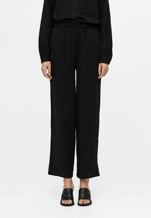 Spodnie materiałowe