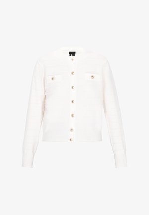 Balts adīts kardigāns ar apaļu kakla izgriezumu, zeltītām pogām un divām priekšējām kabatām. Audumu rotā reljefi svītras.