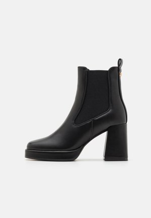 Platform ankle boots - black