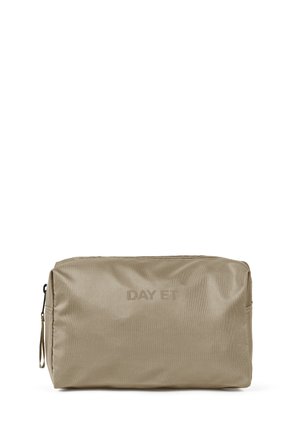 Beige rectangular cosmetic bag made of smooth, water-resistant fabric with embossed logo, zip closure, and a side handle for portability.