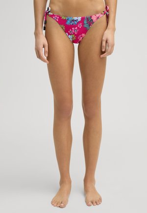 Rosa Blumen-Bikiniunterteil mit seitlichen Bändern, verziert mit einem tropischen Druck aus blauen und grünen Blättern sowie bunten Blumen. Glatte Textur.