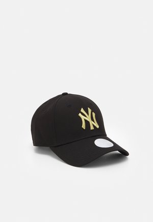 Black baseball cap made of fabric with a curved visor. Features a raised yellow embroidered logo on the front and a white circular tag on the brim.