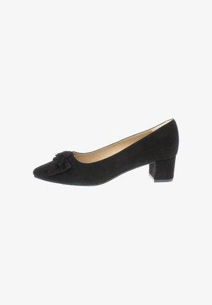 Black suede pump featuring a pointed toe and a small bow detail on the upper. Chunky heel for stability. Smooth interior lining.