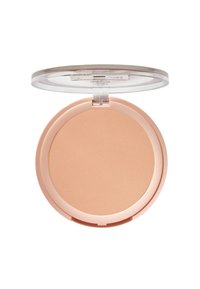 Poudre compacte translucide dans un emballage rond avec un couvercle transparent. Texture lisse, couleur beige clair, design minimaliste.