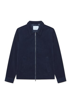 Navy corduroy jacket with a zip front, pointed collar, and two side pockets. Textured fabric, long sleeves, and cuffed hems.