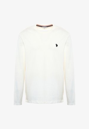 Camicia bianca a maniche lunghe in cotone. Caratterizzata da un collo rotondo, un piccolo logo ricamato sul lato sinistro del petto e un bordo del colletto a contrasto.