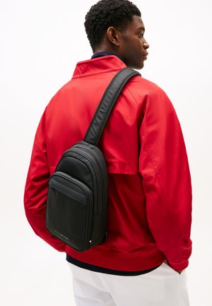 REPREVE SLING BAG - Cross body bag - black