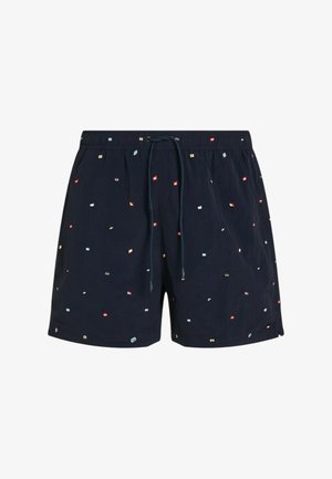 Pantaloni corti blu navy con vita elastica e cordino, caratterizzati da motivi geometrici multicolori su tutta la superficie. Materiale leggero.
