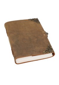 Brown leather journal with decorative brass corners, flanked by two metal studs. Contains blank white pages with a textured cover.
