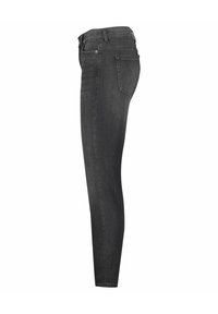 Jeans skinny negros de denim, con un talle medio, cinco bolsillos y una textura suave con un acabado ligeramente desgastado.
