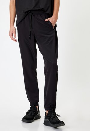 Koton SPORT - Pantalones deportivos - black
