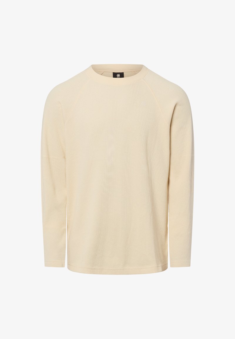 Langärmliges T-Shirt in Creme mit strukturiertem, geripptem Design und rundem Ausschnitt. Verfügt über Raglanärmel und eine lockere Passform.