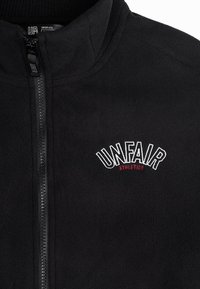 UNFAIR ATHLETICS - Kurtka z polaru