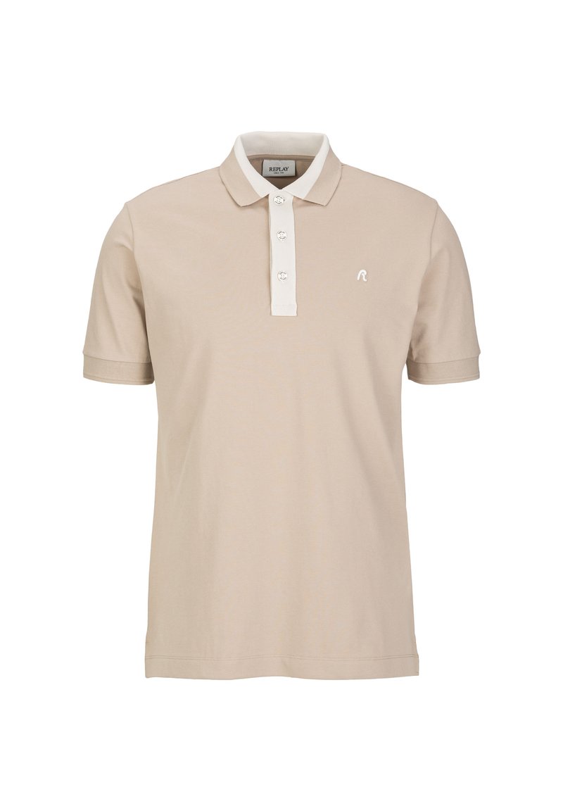 Beige polo shirt van katoen, met een witte kraag en een placket met drie knopen. Klein logo op de linkerborst. Korte mouwen.