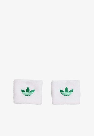 Witte katoenen polsbandjes met groen geborduurd trefoil-logo, met een gestructureerd oppervlak en rechthoekige vorm.