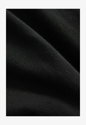 Must värviga kangas, millel on pehme ja tekstureeritud pind, millel on väike venivus ja sile langevus. Materjal näeb välja kerge ja vastupidav.