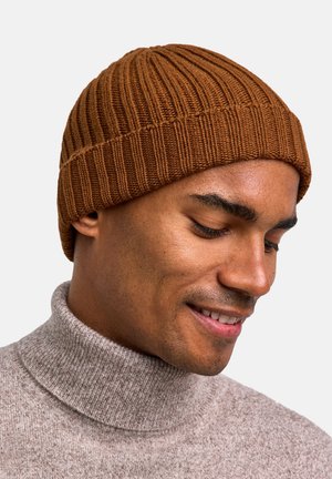 Berretto a maglia a coste marrone realizzato in morbido filato, design aderente, presenta un motivo testurizzato e una vestibilità avvolgente e calda sulla testa.