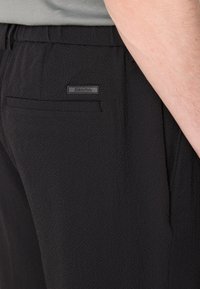 Calvin Klein PULL ON - Trousers - black
