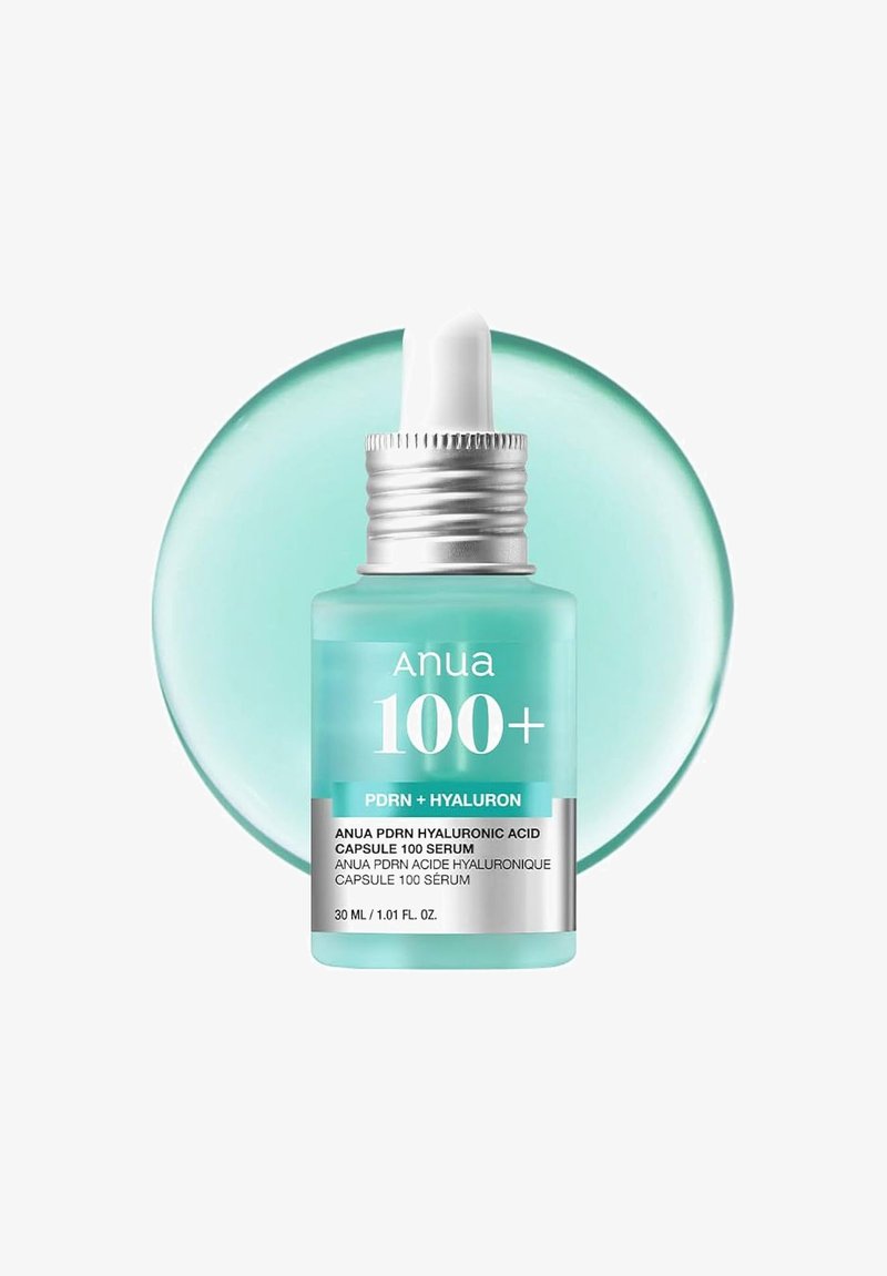 Dropper bottle of Anua 100+ PDRN and Hyaluronic Acid serum with light blue liquid and silver label, 30ml size.