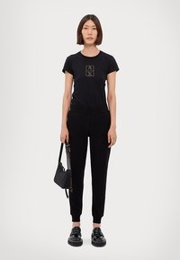 EA7 Emporio Armani TROUSER - Träningsbyxor - black