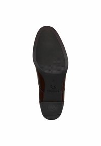 Chaussure en cuir marron avec une semelle en caoutchouc noir texturé, dotée d'un bout arrondi et d'une marque minimale sur la semelle. Taille 37 indiquée.