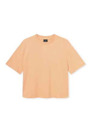 Koszulka z krótkim rękawem z miękkiej brzoskwiniowej bawełny, luźny krój, okrągły dekolt, bez wzorów. Gładka tekstura, standardowa długość hemu.