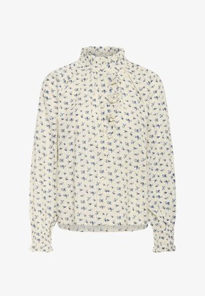 Krém színű blúz fodros álló nyakkal, kék virágmintával, hosszú ujjakkal, gumírozott mandzsettákkal és gombos elejű részlettel.