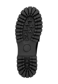 Suola di stivale in gomma nera con battistrada prominente. Presenta scanalature profonde e accenti triangolari. Marcata "Wittchen handmade" vicino al tallone.