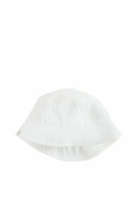White bucket hat made of textured fabric with a soft, crinkled appearance. Features a wide, floppy brim and a small sewn label.