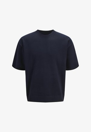 Marineblauwe korte mouw crewneck t-shirt, gemaakt van zachte katoen, heeft een relaxte pasvorm en ribbelzomen bij de nek en onderkant. Glad textuur.