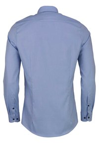 Lyseblå langermet skjorte med myk tekstur, knappedyerser og standard krage. Har en rett søm og subtil design.