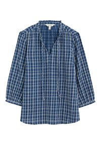 Blouse en flanelle bleu marine à carreaux avec un col en V, des manches longues et des poignets froncés. Confectionnée dans un tissu léger avec un motif à carreaux blancs.