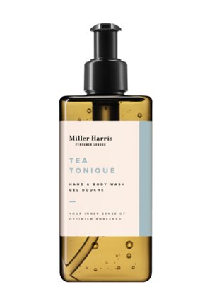 Miller Harris Tea Tonique Hand- und Körperwaschgel in einer bernsteinfarbenen Flasche mit schwarzer Pumpe, durchsichtigem Gel und weiß-blauem Etikett.