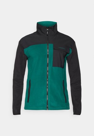 Veste en polaire avec un corps vert et des manches noires, col haut, fermeture éclair sur le devant et poche poitrine zippée.