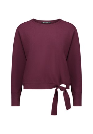 Bordowy sweter z okrągłym dekoltem, długimi rękawami i wiązaniem z boku. Wykonany z teksturowanej tkaniny o luźnym kroju.