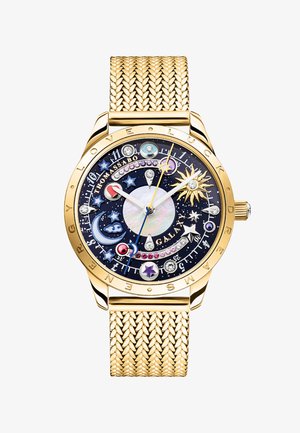 Orologio da polso in oro con cinturino intrecciato, quadrante a tema celeste con stelle, sole, luna, gemme colorate e motivi spaziali, nome del marchio visibile.