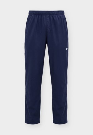 Reebok, ID TRAIN UNLINED - Pantalon de survêtement - vector navy
