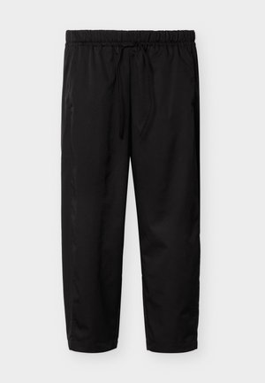 Black casual pants with elastic waistband and adjustable drawstring, straight-cut legs, and side pockets, set against a plain background.